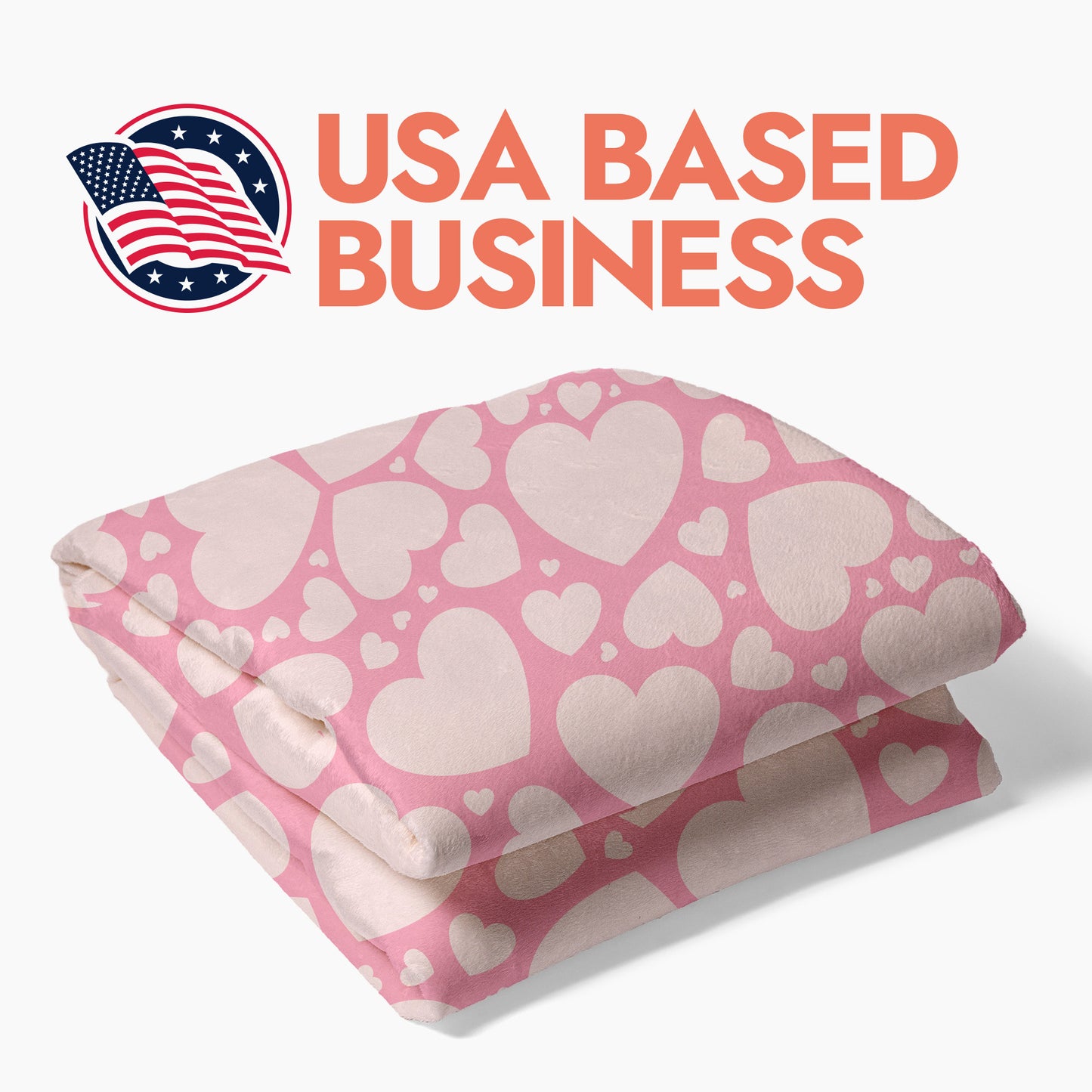 Folded pink blanket with white hearts with heading text 'USA Based Business'.