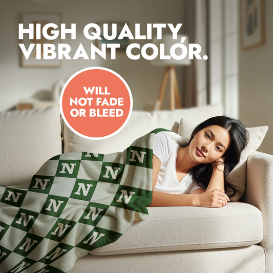 Woman lying on couch with monogram fall theme fleece blanket and header text 'high quality, vibrant color'.