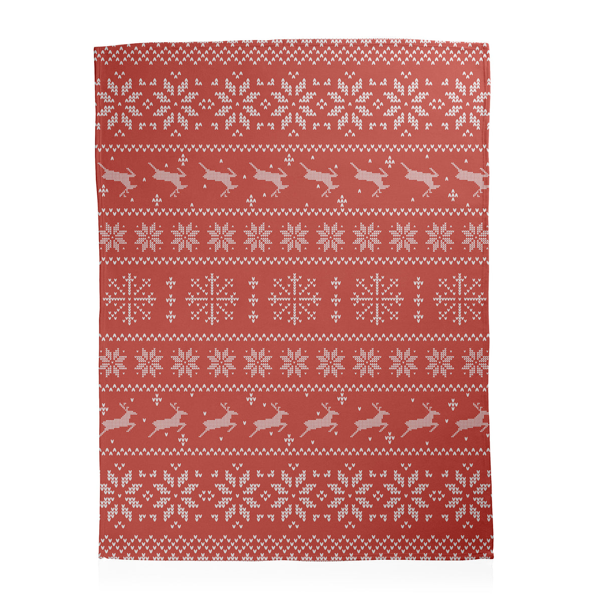 Traditional red and white Christmas themed designs featuring reindeers and snowflakes printed on a fleece blanket.