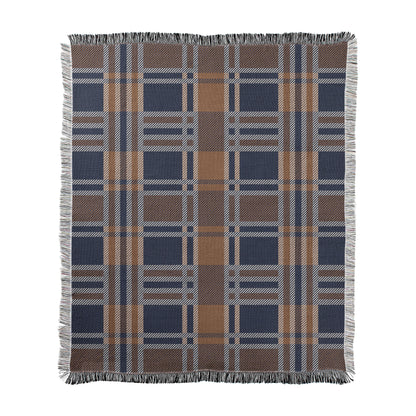 Brown and blue plaid pattern printed on a woven cotton-polyester blanket with decorative fringed edges.