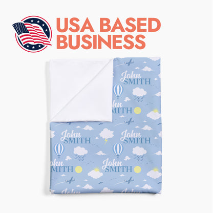 Personalized airplane & sky baby swaddle with header text 'USA Based Business'