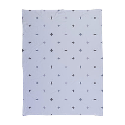 Blue and grey star pattern printed on a baby swaddle.