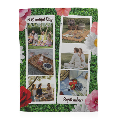 Personalized photo calendar with family picnic images on a grass background with flowers.
