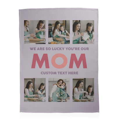Personalized photo blanket with text 'We are so lucky you're our mom' and placeholder for custom text printed on a soft fleece blanket.