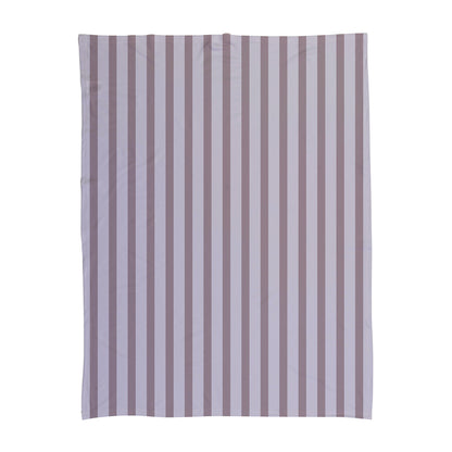 Striped baby swaddle with different shades of pink.