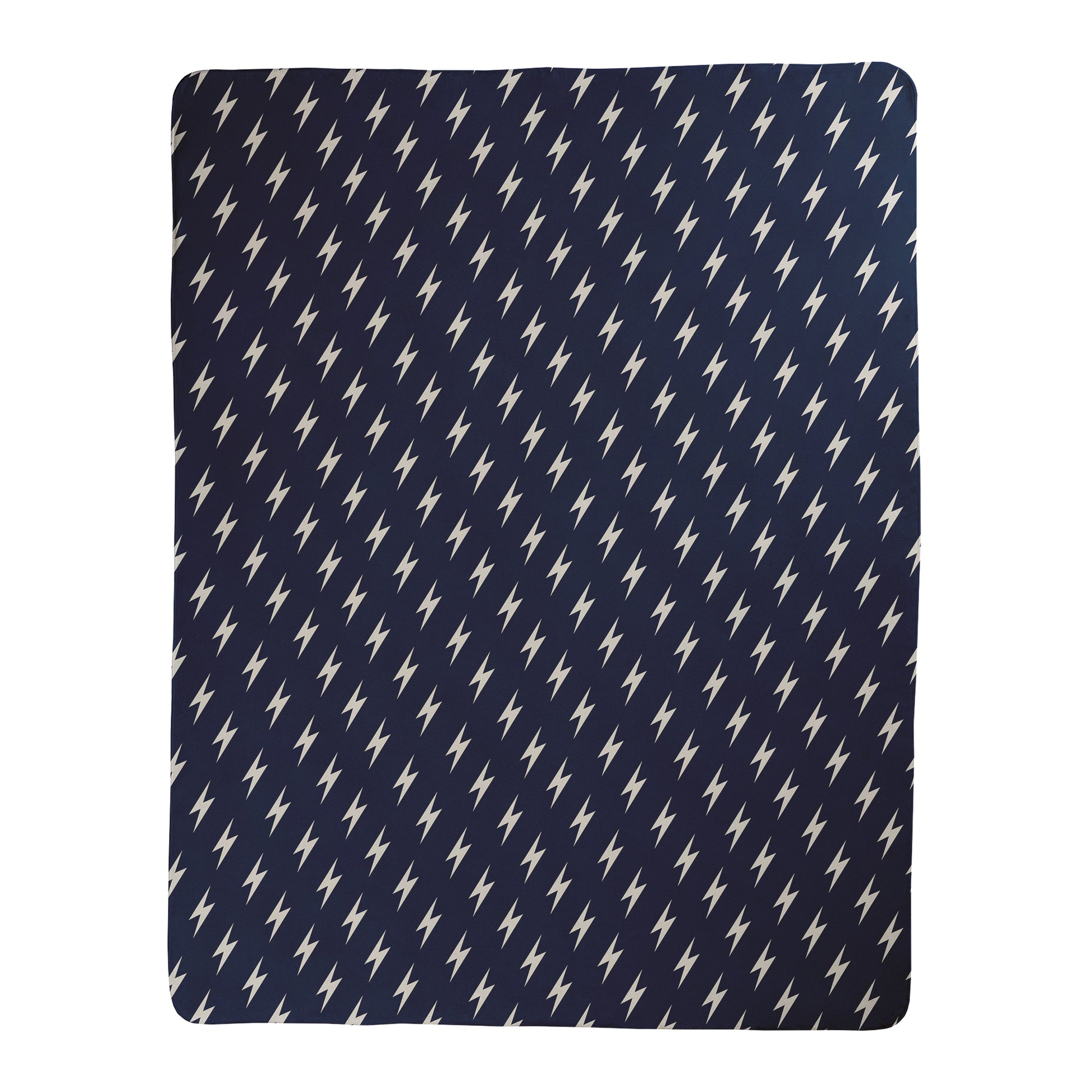 Navy background with white lightning bolt pattern printed on a sherpa fleece backed blanket.