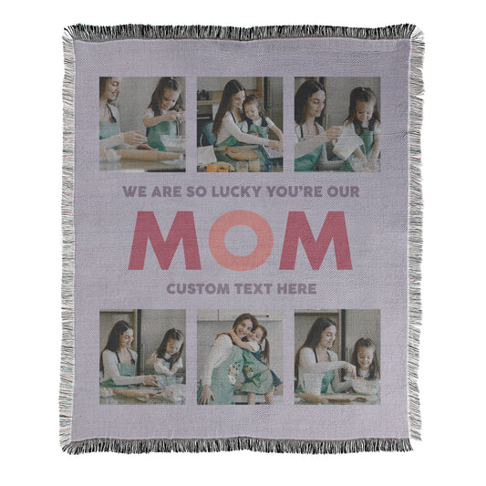 Personalized photo blanket with text 'We are so lucky you're our mom' and placeholder for custom text printed on a woven cotton-polyester blanket with decorative fringed edges.