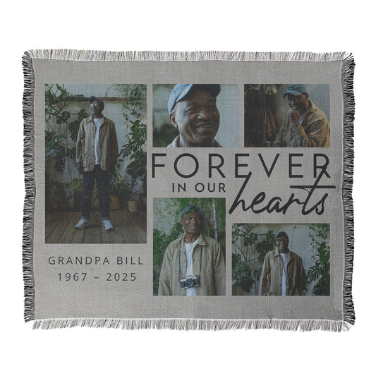 Memorial blanket with 5 photos of a man with example text 'Forever in our Hearts' 'Grandpa Bill 1967 - 2025' printed on a blanket with decorative fringed edges.