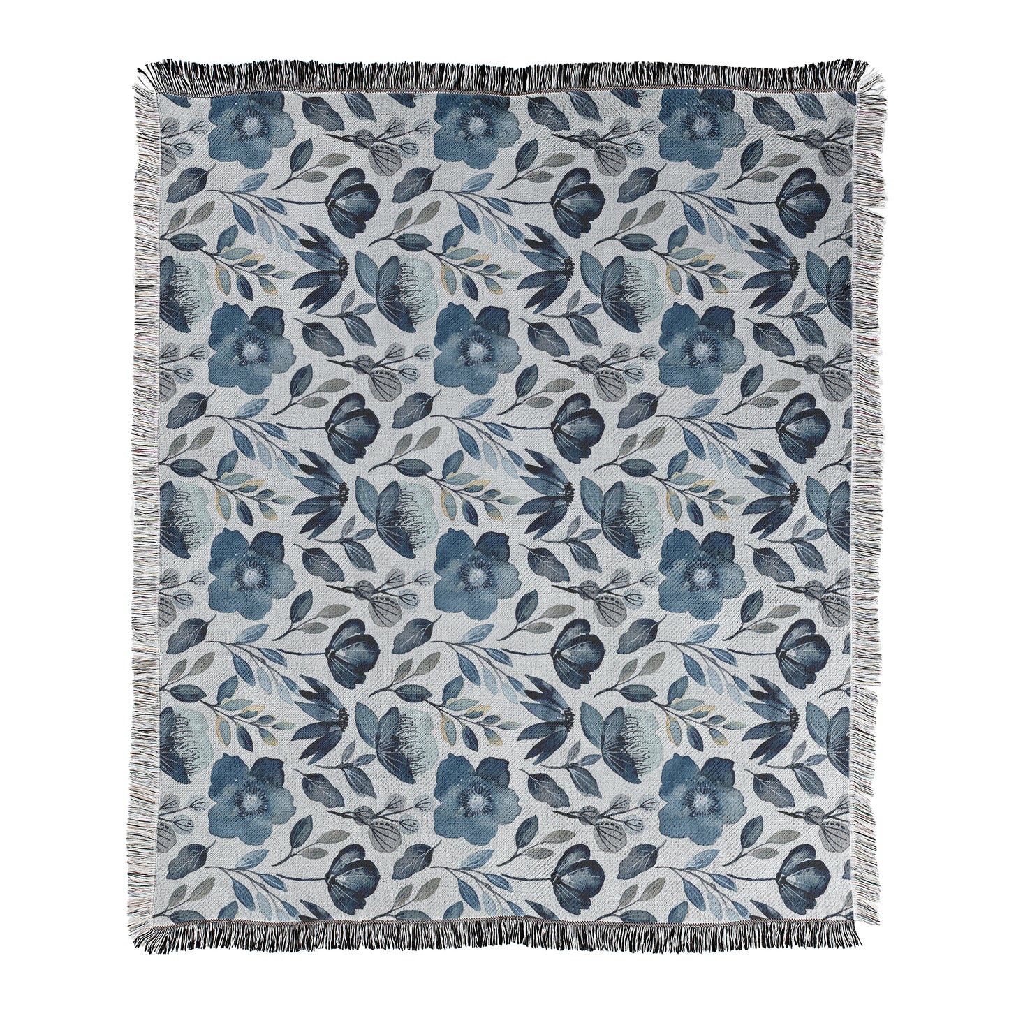 Floral patterned blanket with blue flowers and leaves on a light background printed on woven cotton/polyester blend blanket with decorative fringed edges.