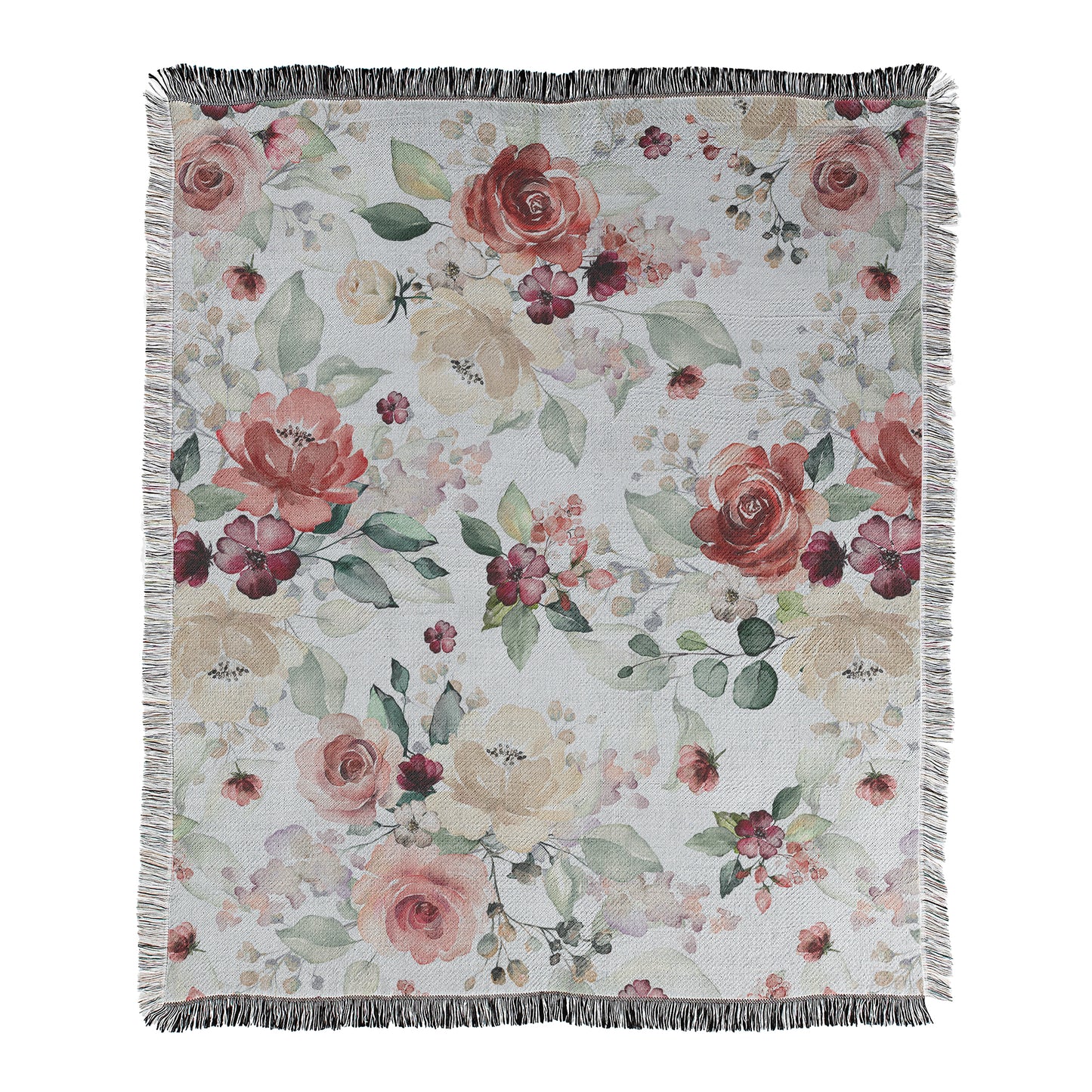 Floral patterned blanket with colorful pink flowers and leaves on a light background printed on woven cotton/polyester blend blanket with decorative fringed edges.
