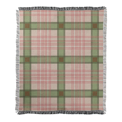 Blush pink with sage green plaid design printed on a woven fleece blanket with decorative fringed edges.