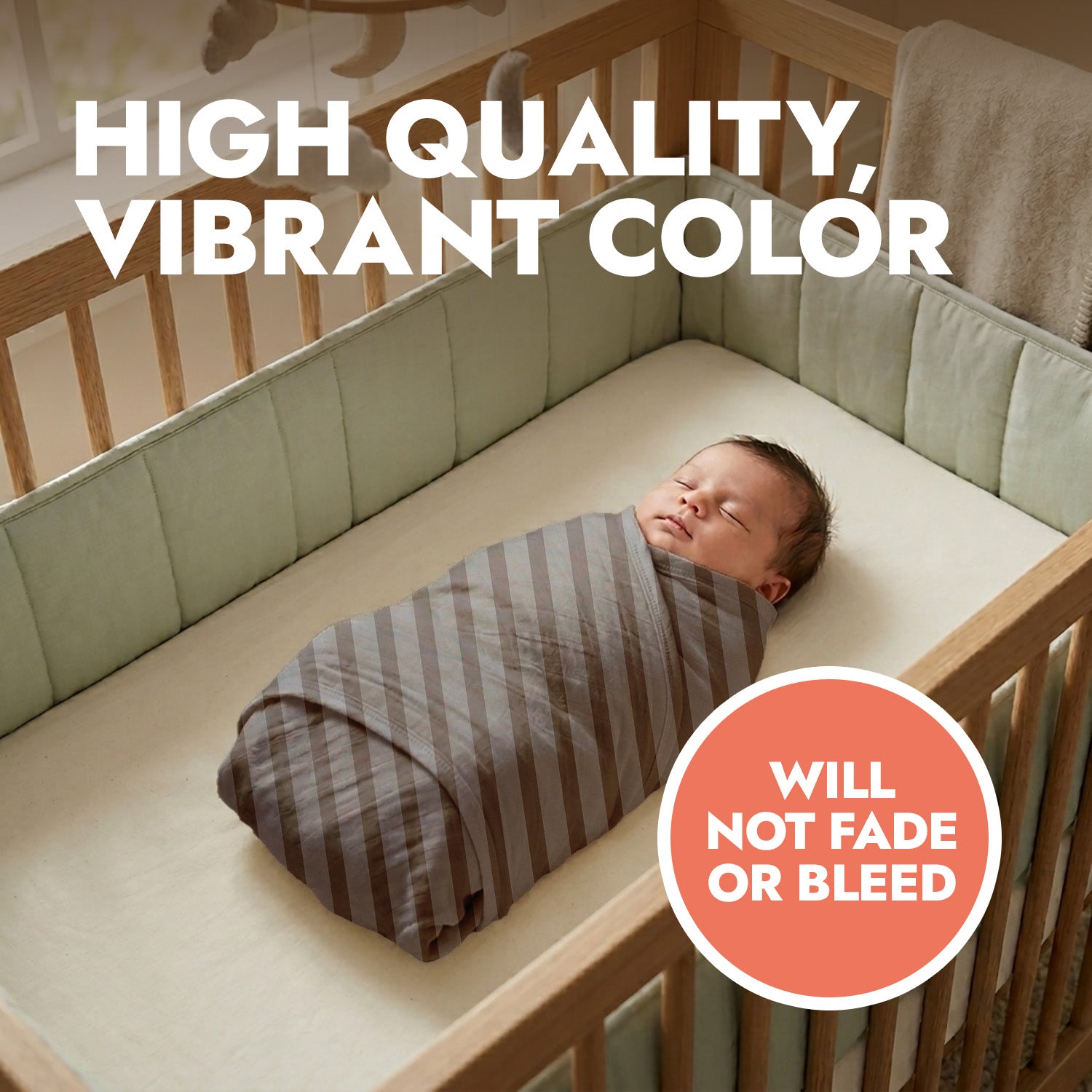 Newborn baby wrapped in a striped swaddle in a crib with text stating high quality, vibrant color.