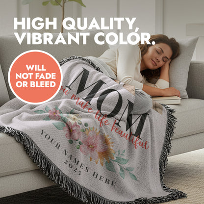 Woman laying on sofa with custom Mother's Day blanket featuring fringed edges with heading text 'high quality, vibrant color'.