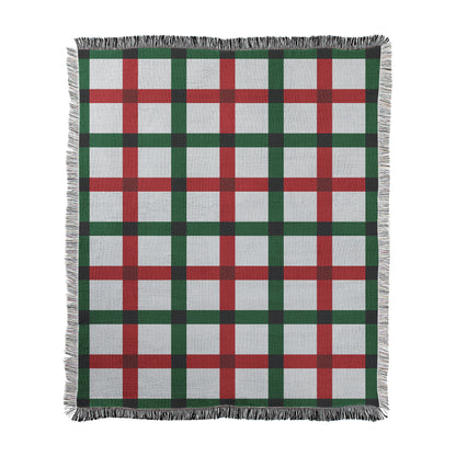 Checkered pattern with Christmas colors green and red stripes reprinted on a woven cotton-polyester blanket with decorative fringed edges.